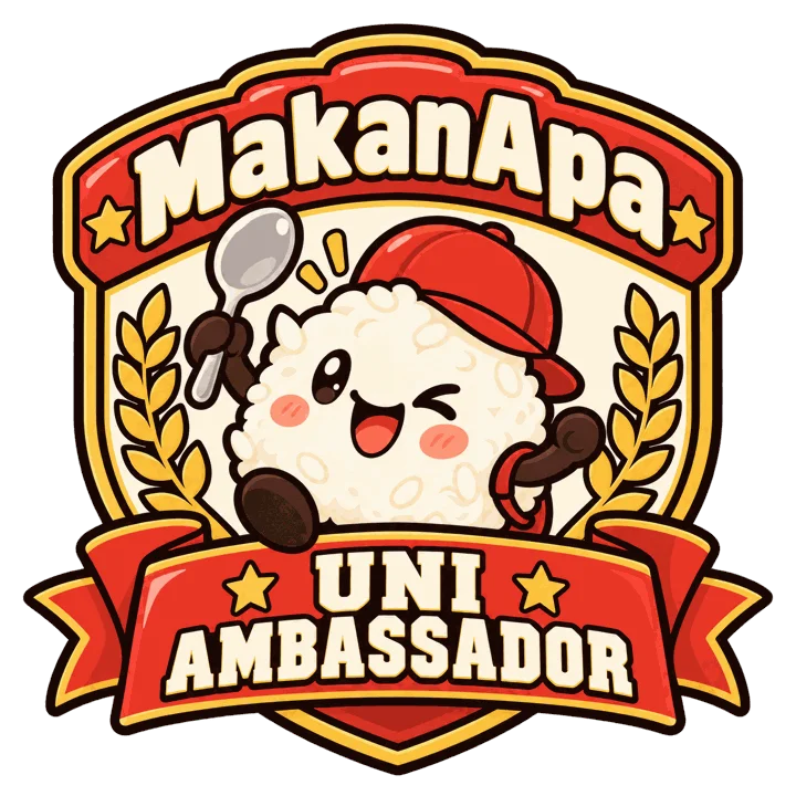 MakanApa ambassador crest: the MakanApa rice-ball mascot in a red cap holding a spoon
